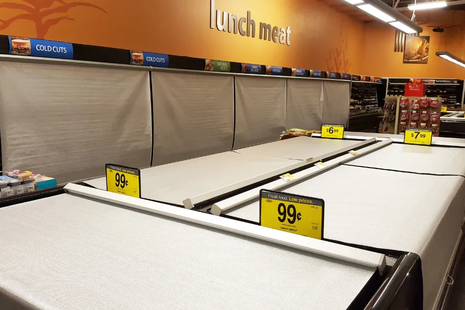 Night covers for supermarket lunch meat cases Econofrost night covers installed on open lunch-meat and refrigerated display cases